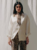 Alma blouse in Iced Mango, mother-of-pearl buttons, recycled PET, eco-friendly, loose cut.