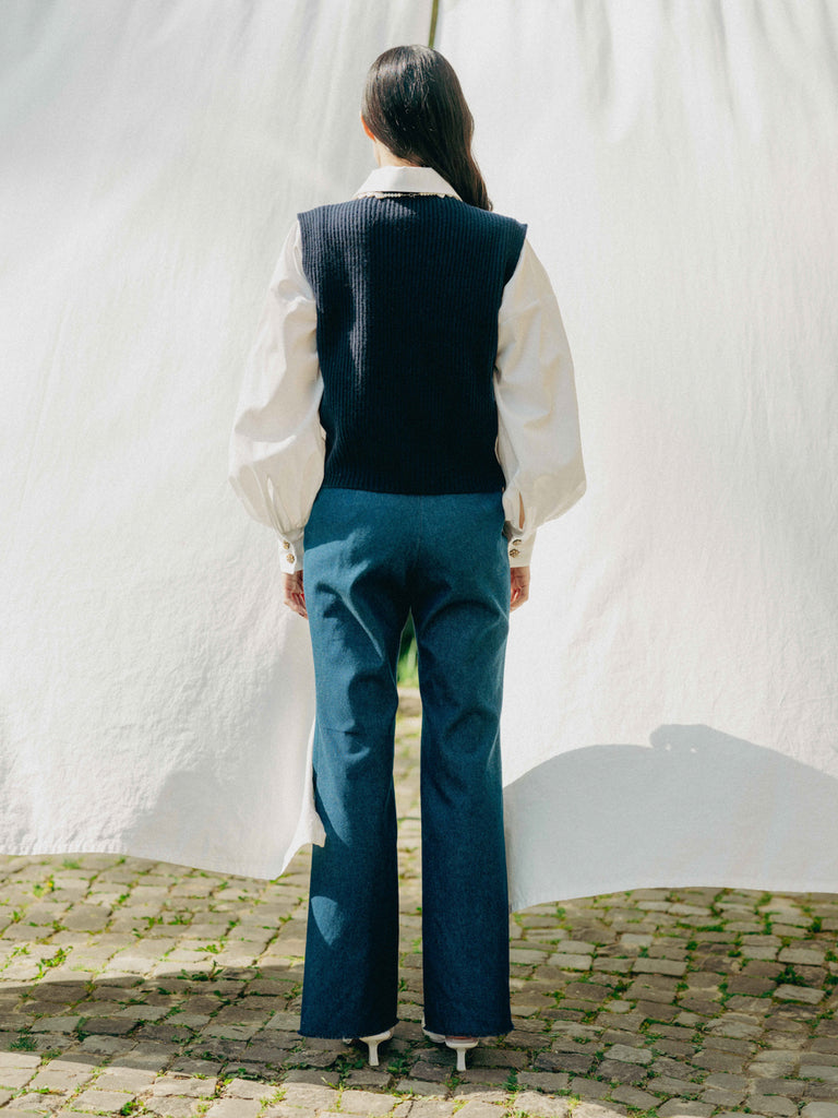 ASTRA: Flared legs, hook closure, handmade fringes. Sustainable, versatile, stylish. GOTS certified.