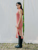 Swiss-made unique rib-knit cotton dress with pleated design, elegant high neckline, and chic side slits, perfect for evening wear or casual style, sustainable and made to order
