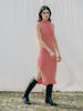 Swiss-made unique rib-knit cotton dress with pleated design, elegant high neckline, and chic side slits, perfect for evening wear or casual style, sustainable and made to order