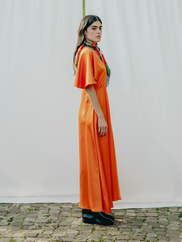 Ethically- and vegan-crafted CHARIS dress from recycled PET, perfect for weddings and special events.