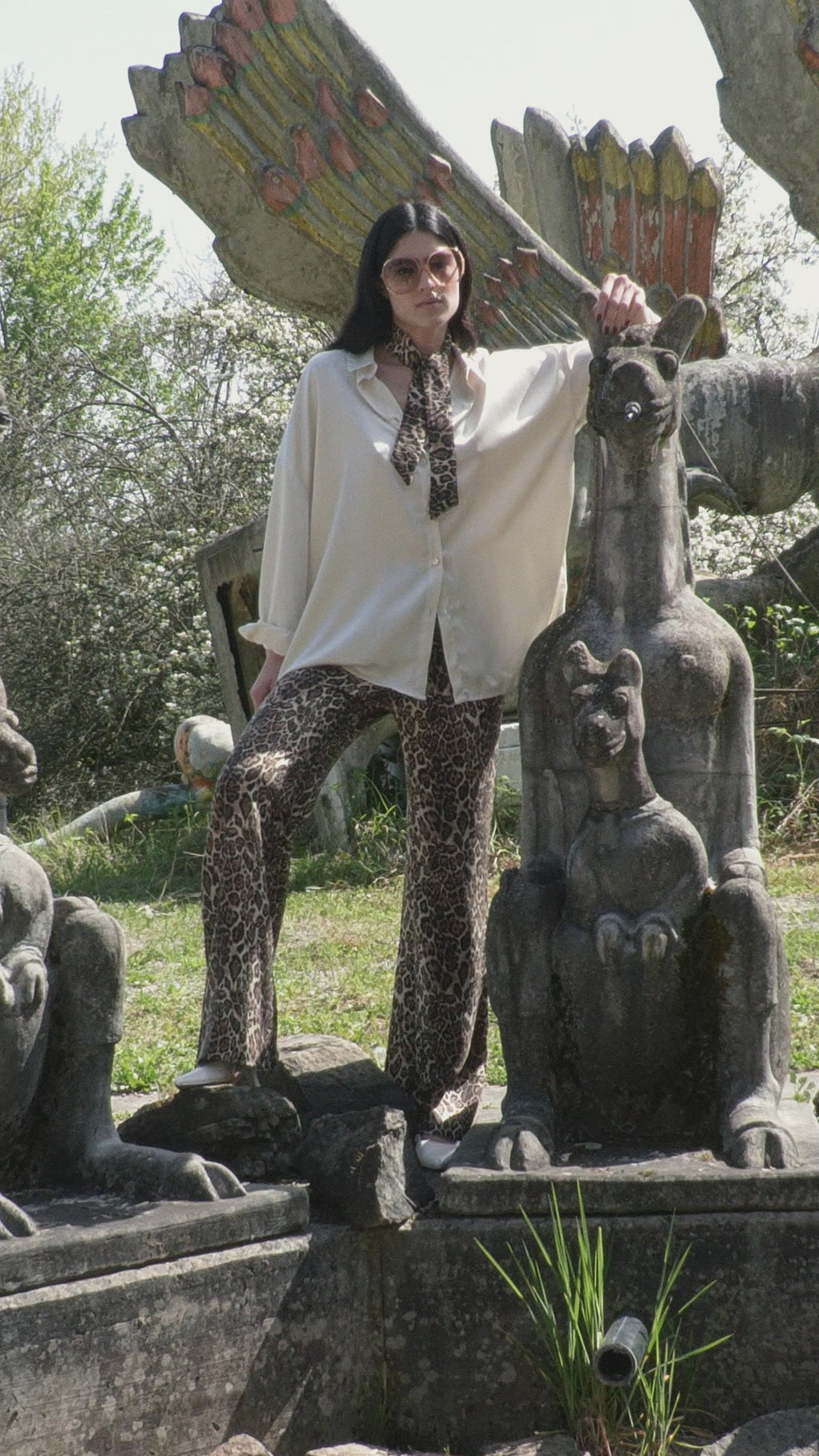 Namira flared pants, relaxed fit, no side pockets, leopard print, versatile for any top or blouse.